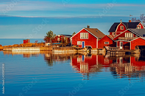 Red houses in village scenic landscape, Höga Kusten, Sweden