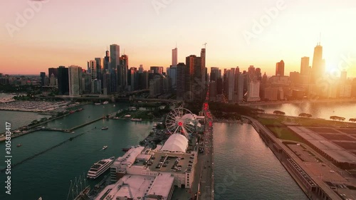 Aerial footage of downtown Chicago and Navy Pier during sunset