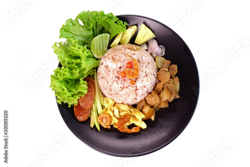 Fried rice with shrimp paste (Khao khluk Kapi) isolated on white background, a flavorful dish in Thai cuisine that consists of primary ingredients of fried rice mixed with shrimp paste (Kapi).Top view photo