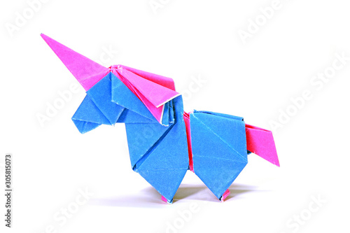 Unicorn. Colorful unicorn origami paper art isolated on white background. Ideas for DIY hobby (Do It Yourself) for Children. 