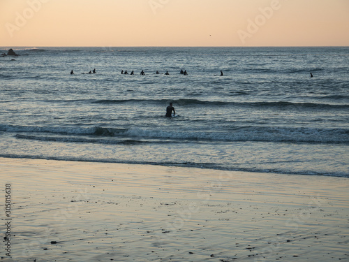 Surfers waiting for a wave, Pacifica, California