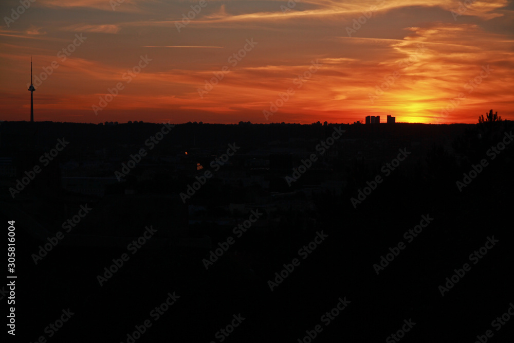 The sunset and the high modern tower The sunset and the high modern tower