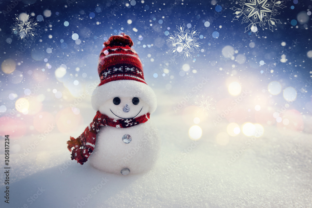 Merry snowman standing in a winter night Christmas landscape. Merry Christmas and Happy New Year Greeting Card Merry snowman standing in a winter night Christmas landscape. Merry Christmas and Happy New Year Greeting Card