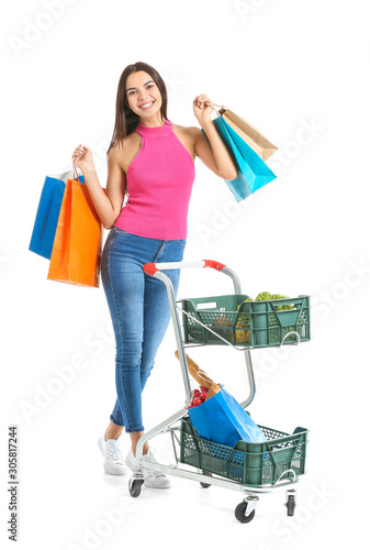 Happy young woman with shop...