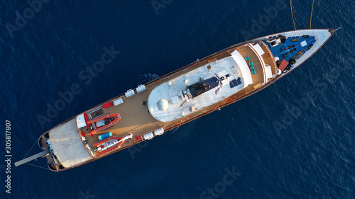 Aerial top down photo of luxury yacht in deep blue Mediterranean sea © aerial-drone