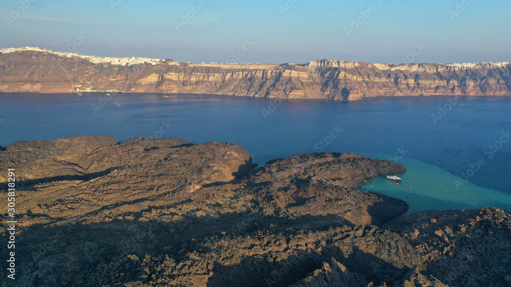 Aerial drone photo of main crater of Santorini island volcano called Kameni, Cyclades, Greece