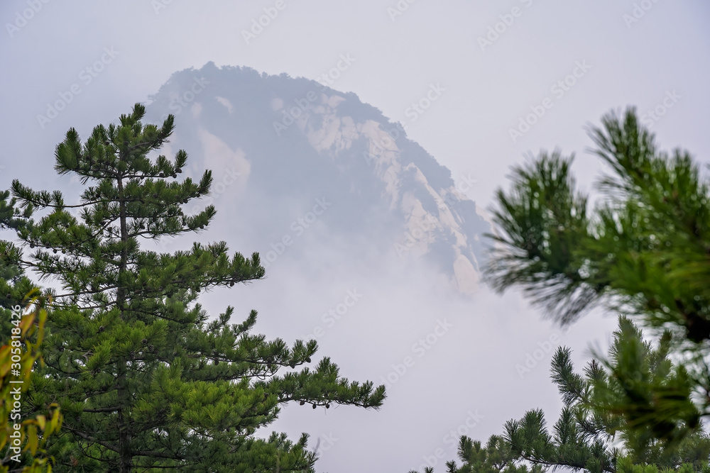 Peak covered in fog as seen from Huashan mountain in China