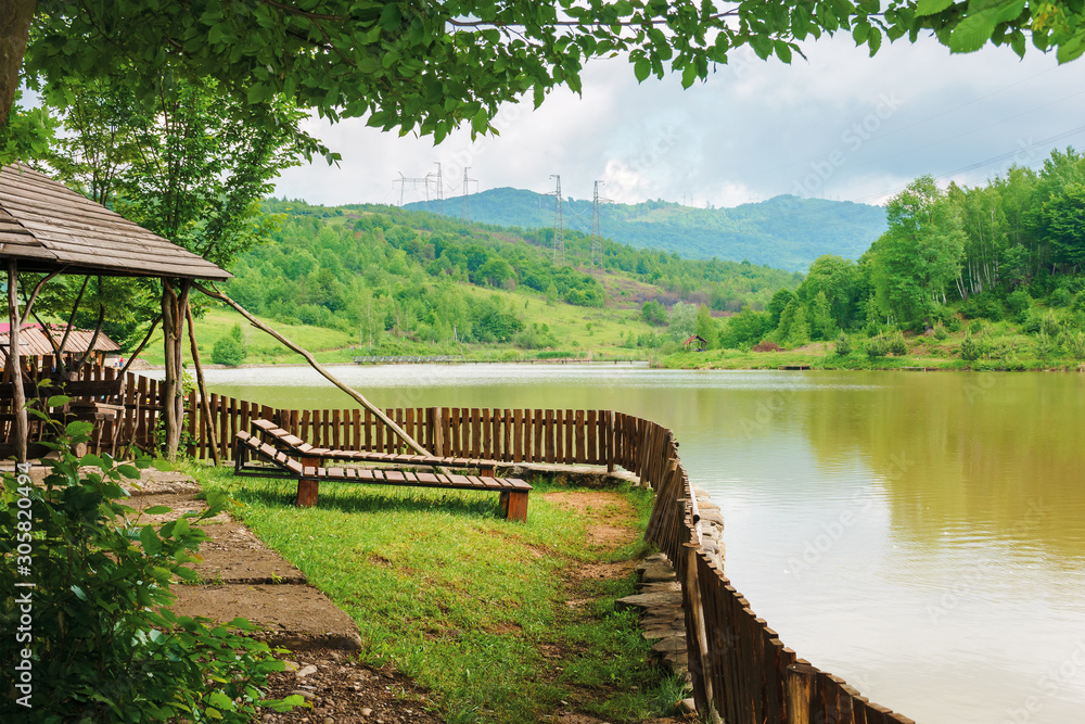 place for rest on the shore of mountain lake. beautiful nature scenery in spring time.place for rest on the shore of mountain lake. beautiful nature scenery in spring time.