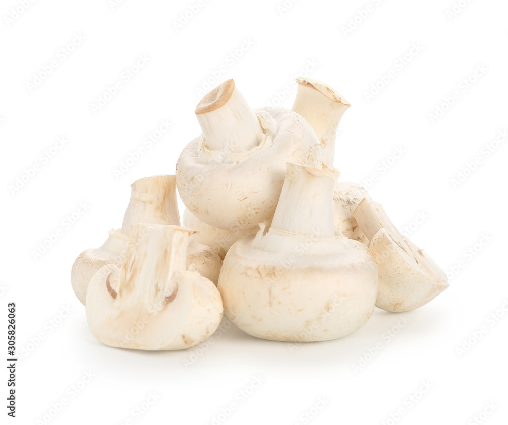 Fresh champignon mushrooms on white background Fresh champignon mushrooms on white background