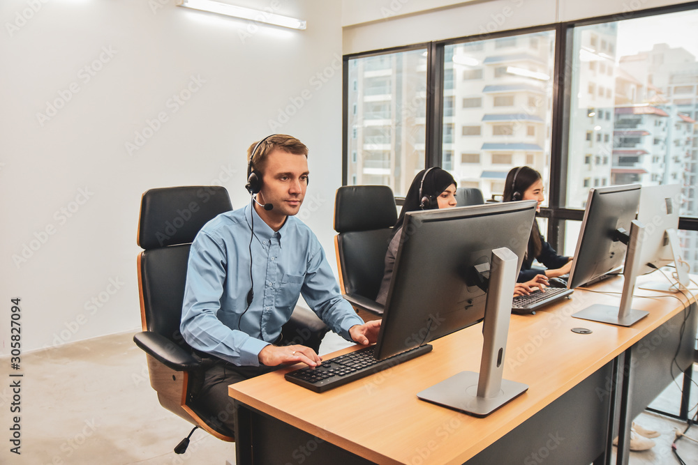 Call center business team working in office computer professional