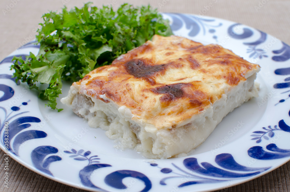 chicken lasagna in mushrooms and bread