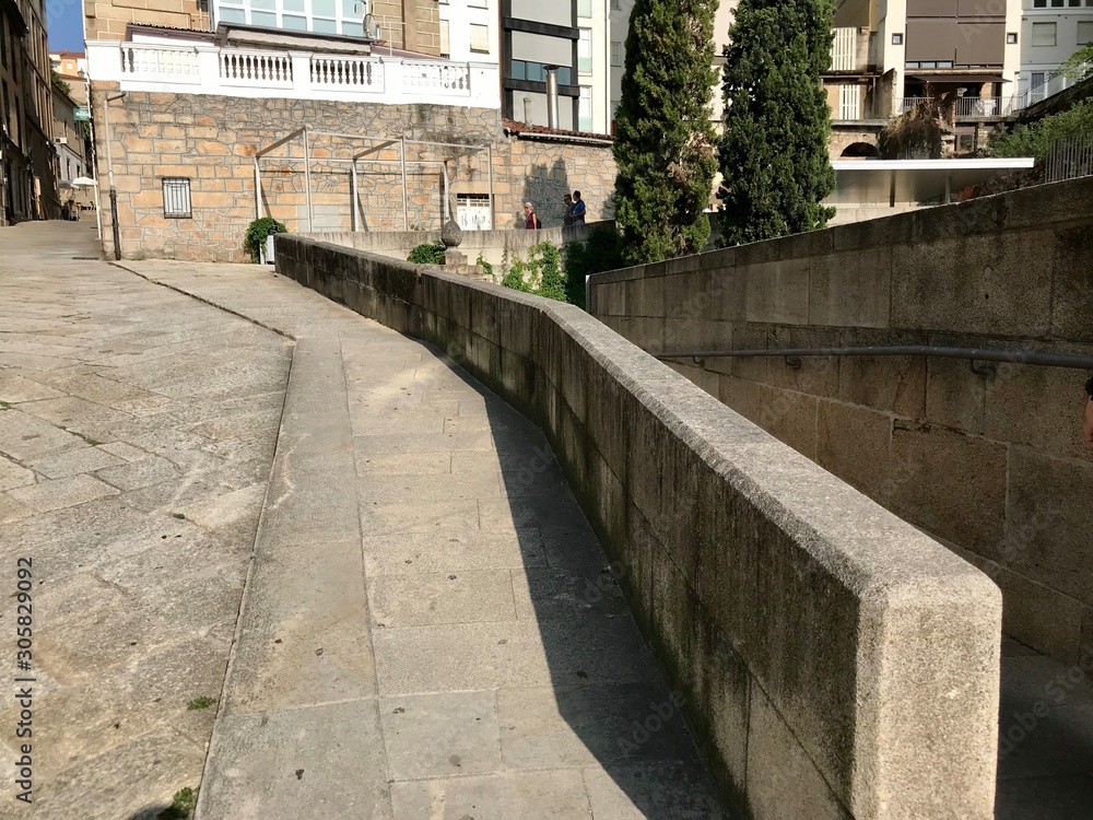 Fototapeta premium Oursense, Ourense / Spain - August 20 2018: View of the streets and buildings of the city center of Ourense in Galicia during a sunny day