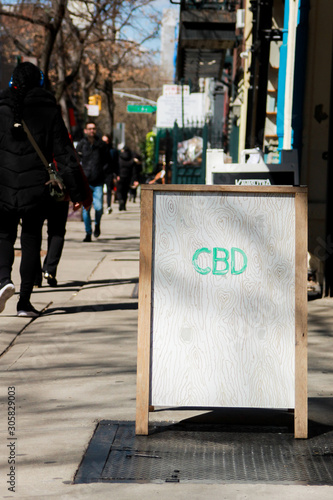 A CBD board at the front door of a shop in Manhattan, New York