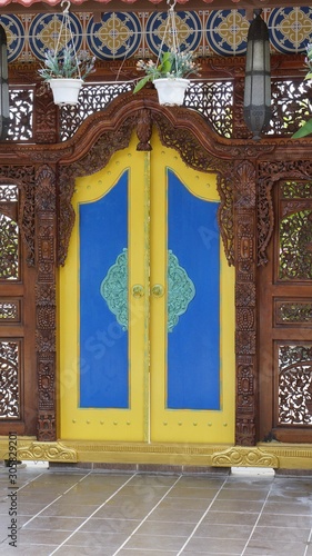 A traditional decorative old door in wall