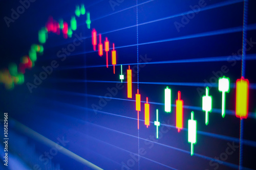 Blue stock exchange market graph on LED screen for business analysis. Finance and economic graphs.