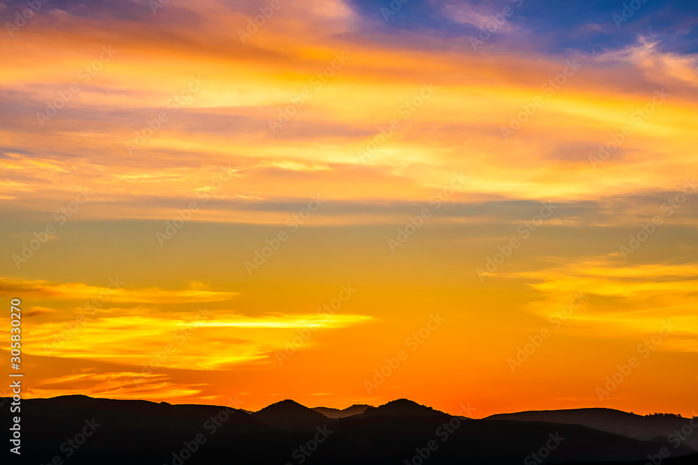 Yellow, Orange Sunset over Horizon 