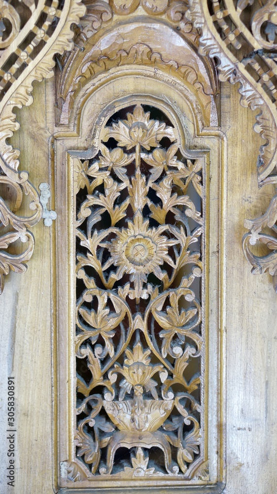 Beautiful handcrafted woodwork on a wall