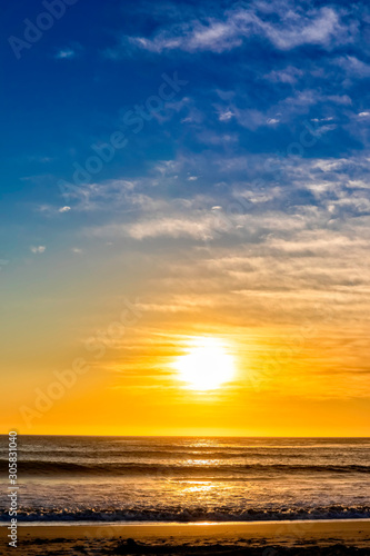 Fototapeta Naklejka Na Ścianę i Meble -  Sunset with Clouds Over Ocean, Sea 