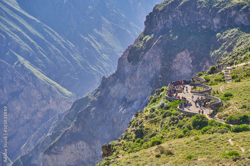 Tourists at the Cruz del Cóndor viewpoint, Colca Canyon, Peru
