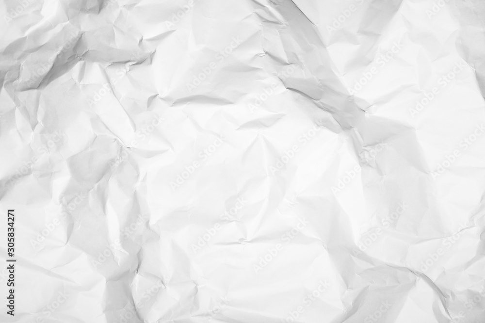 Obraz premium White crumpled paper texture background. 