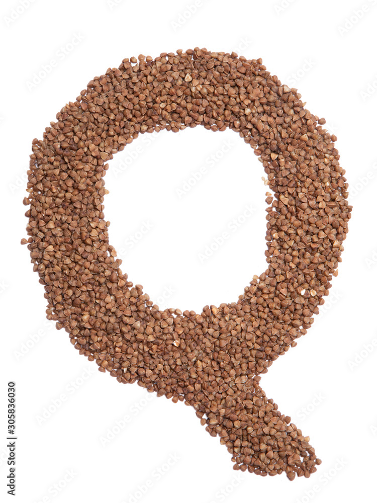 Fototapeta premium Letter Q of the English alphabet from brown dry buckwheat on a white isolated background. Food pattern made from groats. Bright alphabet for shops. Buckwheat for porridge