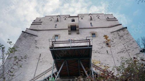 The White Watchtower of Brasov, Romania. Fortified tower used as a defence in the medieval era, now holds a few items and it is open as a museum from time to time. photo