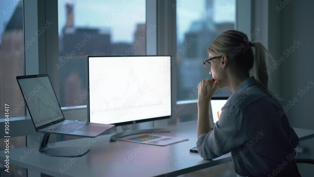 Skilled woman working on laptop and PC computer for research useful information about deposit investment connected to 4g wireless in office interior, Caucasian analytic expert reading blank data Skilled woman working on laptop and PC computer for research useful information about deposit investment connected to 4g wireless in office interior, Caucasian analytic expert reading blank data