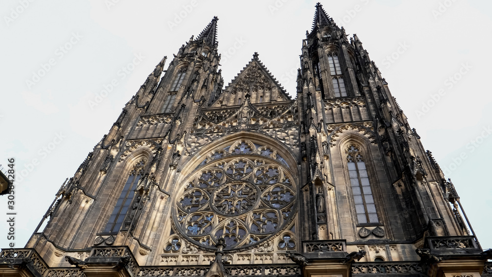 wide angle shot of the front of st vitus cathedral in prague