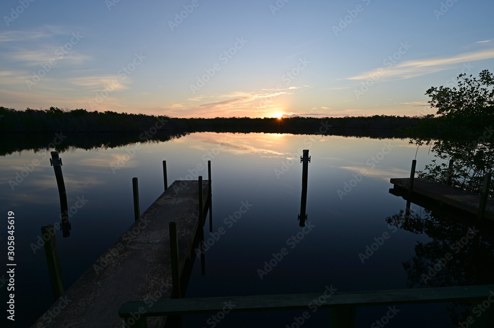 West Lake shelter and docks at sunrise in Everglades National Park, Florida on a calm winter morning. West Lake shelter and docks at sunrise in Everglades National Park, Florida on a calm winter morning.
