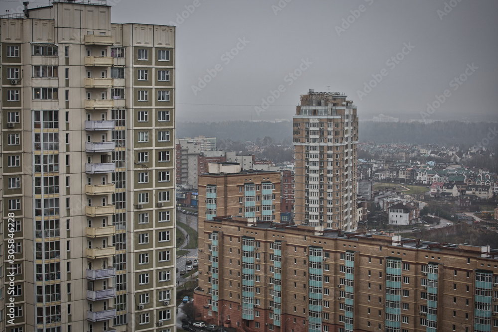 Residential apartments with balconies in a multi-storey building, residential skyscraper