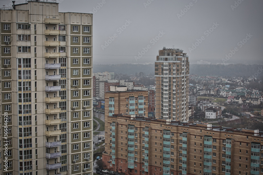 Fototapeta premium Residential apartments with balconies in a multi-storey building, residential skyscraper