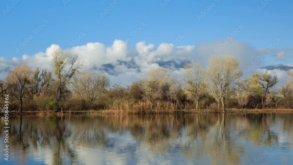 Scenic Lake with Clouds and Mountain Time Lapse Zoom Out Scenic Lake with Clouds and Mountain Time Lapse Zoom Out