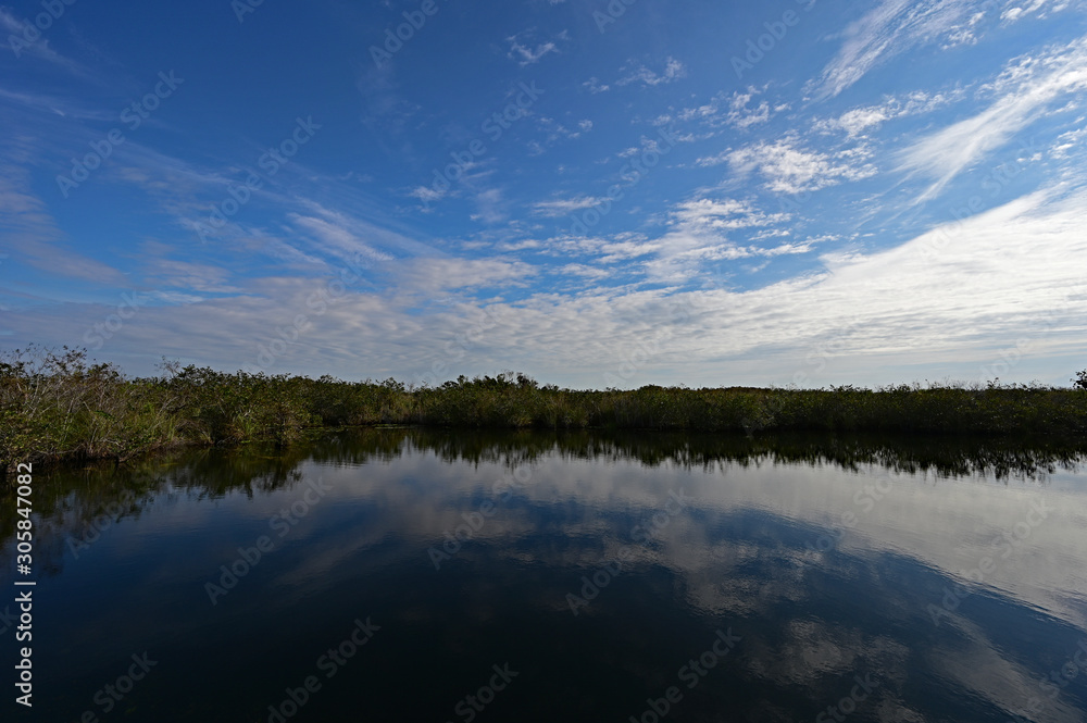 Winter cloudscape over Anhinga Trail in Everglades National Park, Florida.