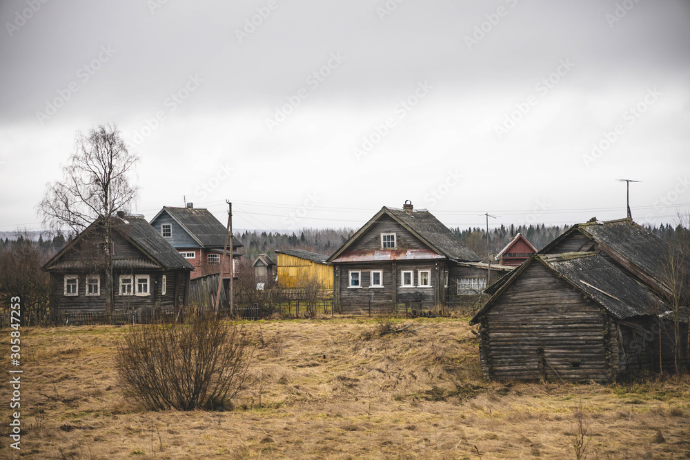 brown houses in the countryside, lots of yellow grass, autumn brown houses in the countryside, lots of yellow grass, autumn