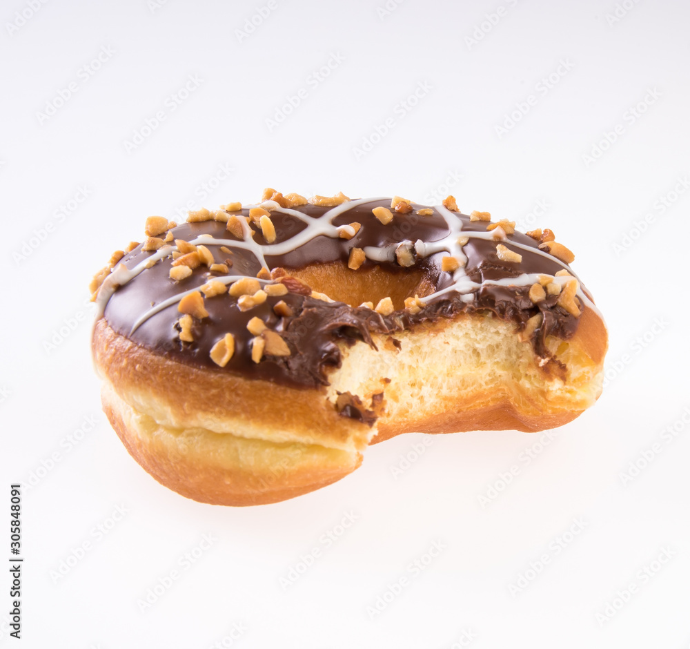 donut or donut with missing bite on a background new. donut or donut with missing bite on a background new.