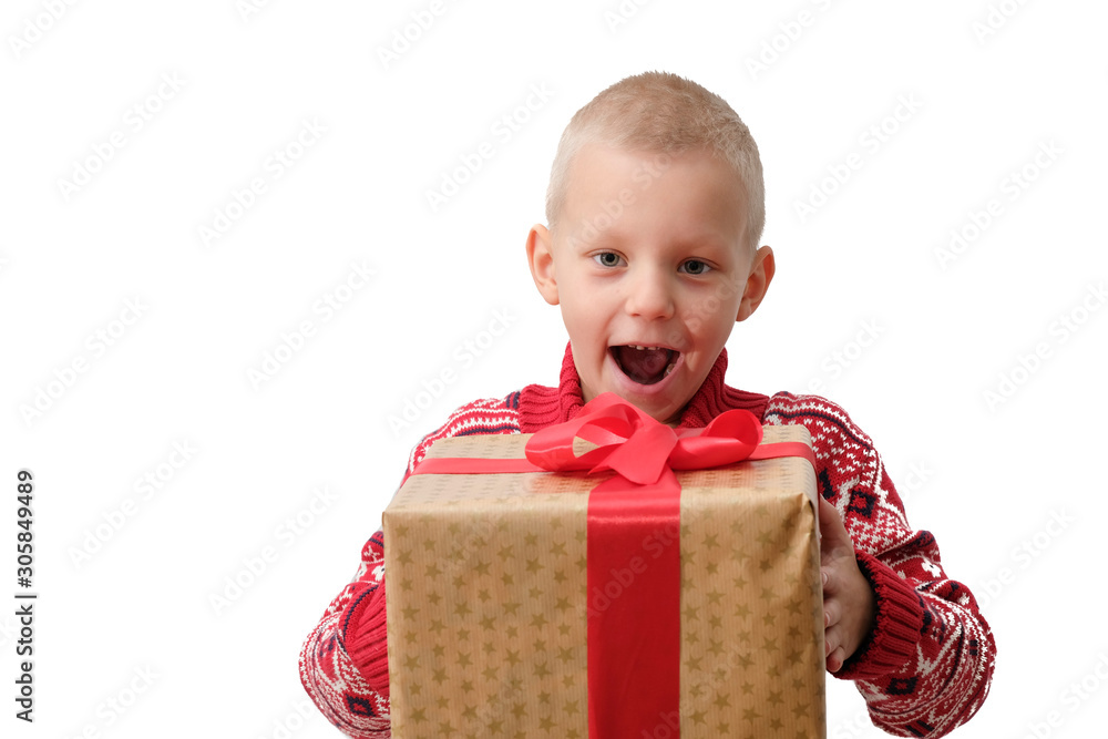 Child holding Christmas gift box in hand. Boy Isolated on white background. New year and x-mas concept. Child holding Christmas gift box in hand. Boy Isolated on white background. New year and x-mas concept.