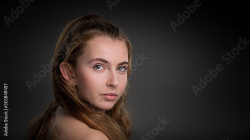 Georgous young girl looking over her shoulders