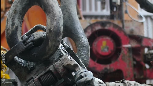 driller operates in the derrick
