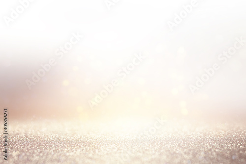 abstract background of glitter vintage lights . silver, gold and white. de-focused © tomertu