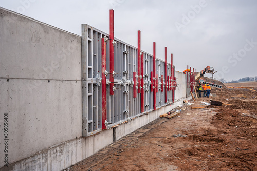 Concrete tunnel walls with installed formwork