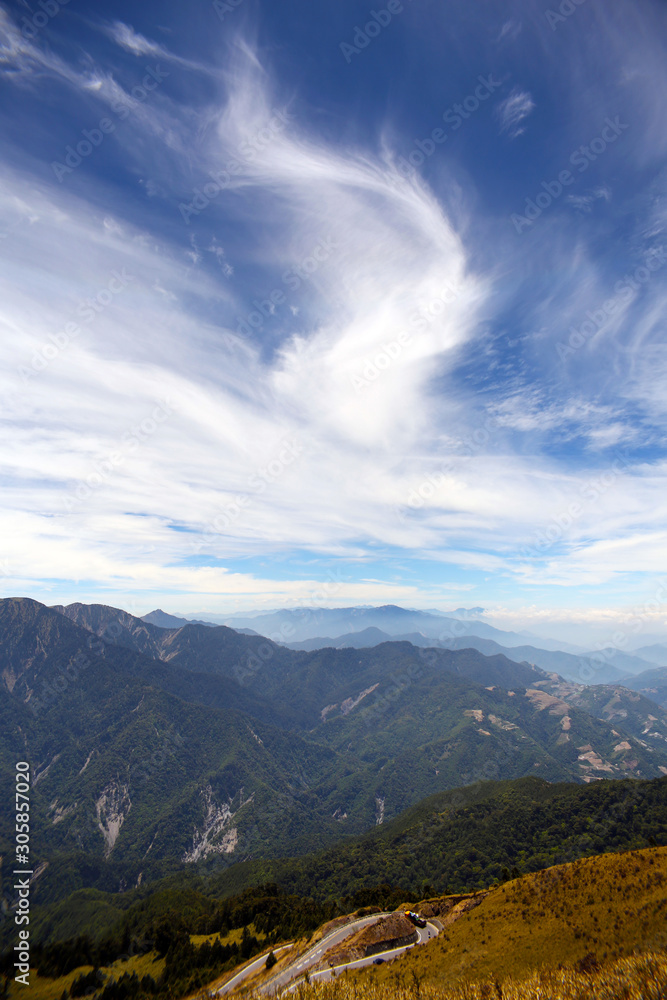 The magnificent mountain scenery in the high mountains of central Taiwan, the clouds in the sky also show a changeable appearance is very beautiful