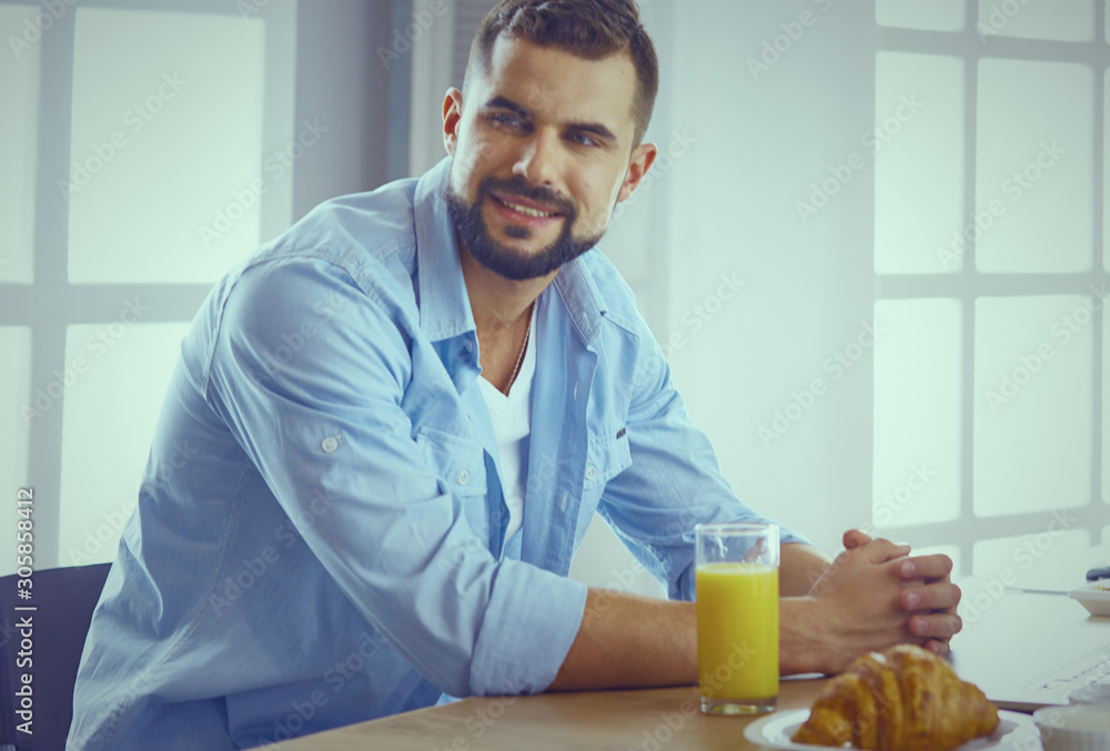a business man breakfasts with notebook and juice a business man breakfasts with notebook and juice
