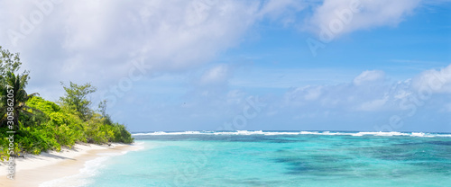 Panoramic view of tropical beach and clean azure water