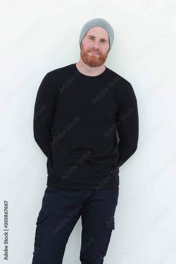 attractive male in black sweater and wool cap attractive male in black sweater and wool cap