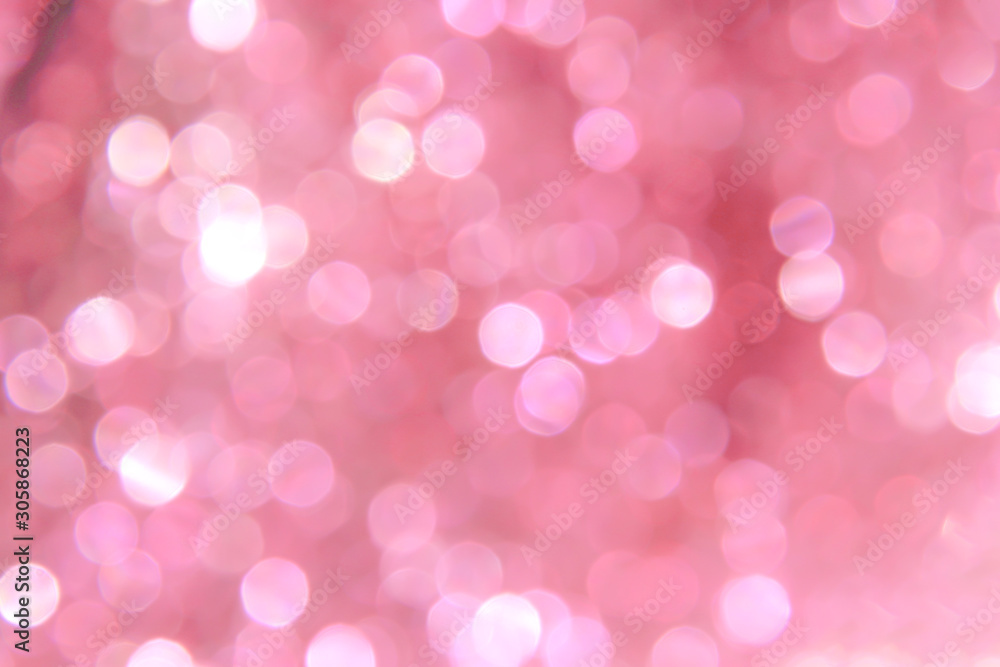 White bokeh sparkle glitter abstract patterns on sweet pink background White bokeh sparkle glitter abstract patterns on sweet pink background