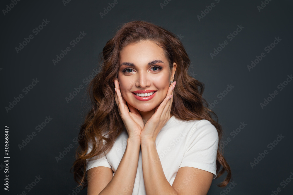 Cheerful woman portrait on gray background Cheerful woman portrait on gray background