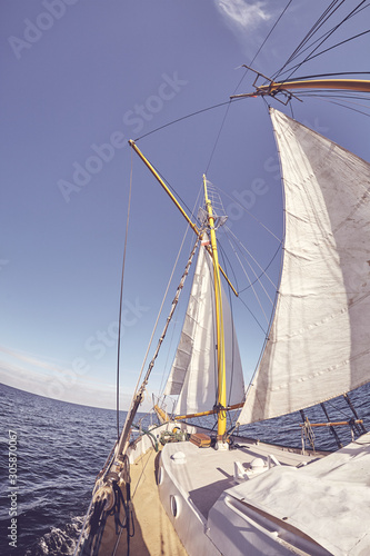 Fisheye lens picture of an old sailing ship, color toning applied.