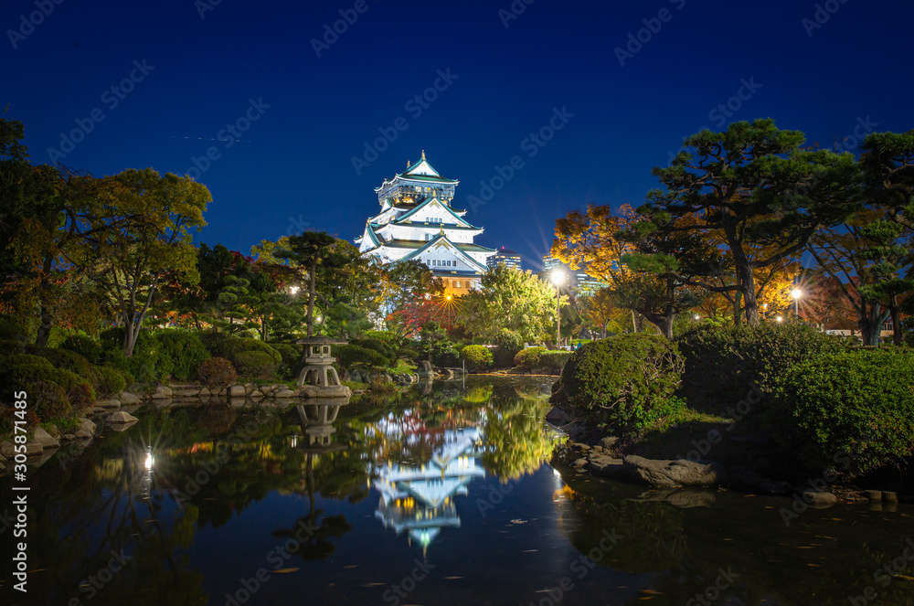 Osaka Castle in Osaka,Kansai,Japan in Fall or Autumn season. Maple tree are turn into red and orange leaf. It is one of most famous landmark in Japan