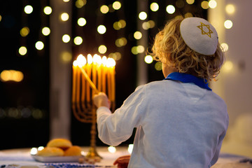 Kids celebrating Hanukkah. Festival of lights.