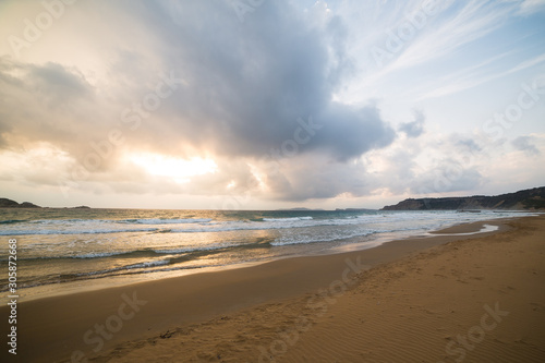 Fototapeta Naklejka Na Ścianę i Meble -  golden sunset on the Greece beach